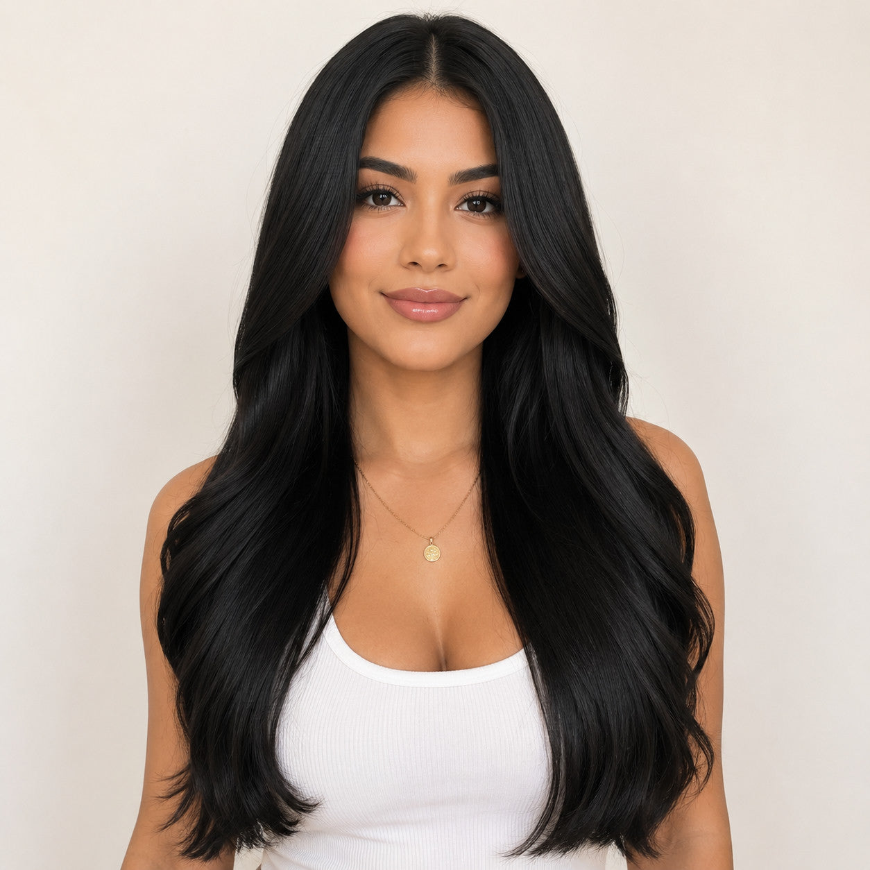 Model wearing #1 Natural Black 20 inch clip-in hair extensions, front view - Sandy Bella